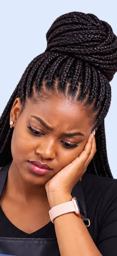 Customer looking at her phone, still waiting for a reply